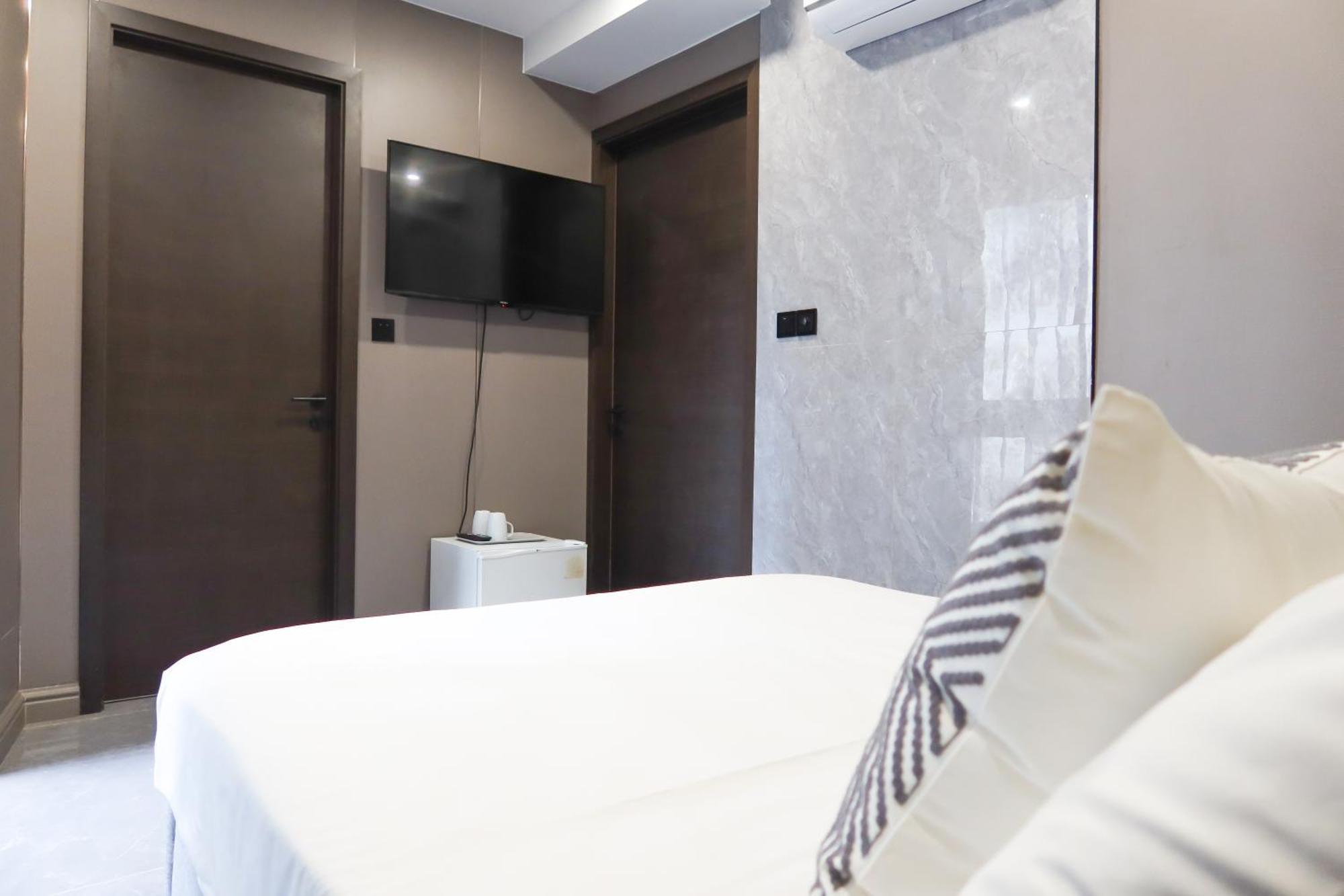 Recharge Studio Apartments&Suites Singapur Habitación foto