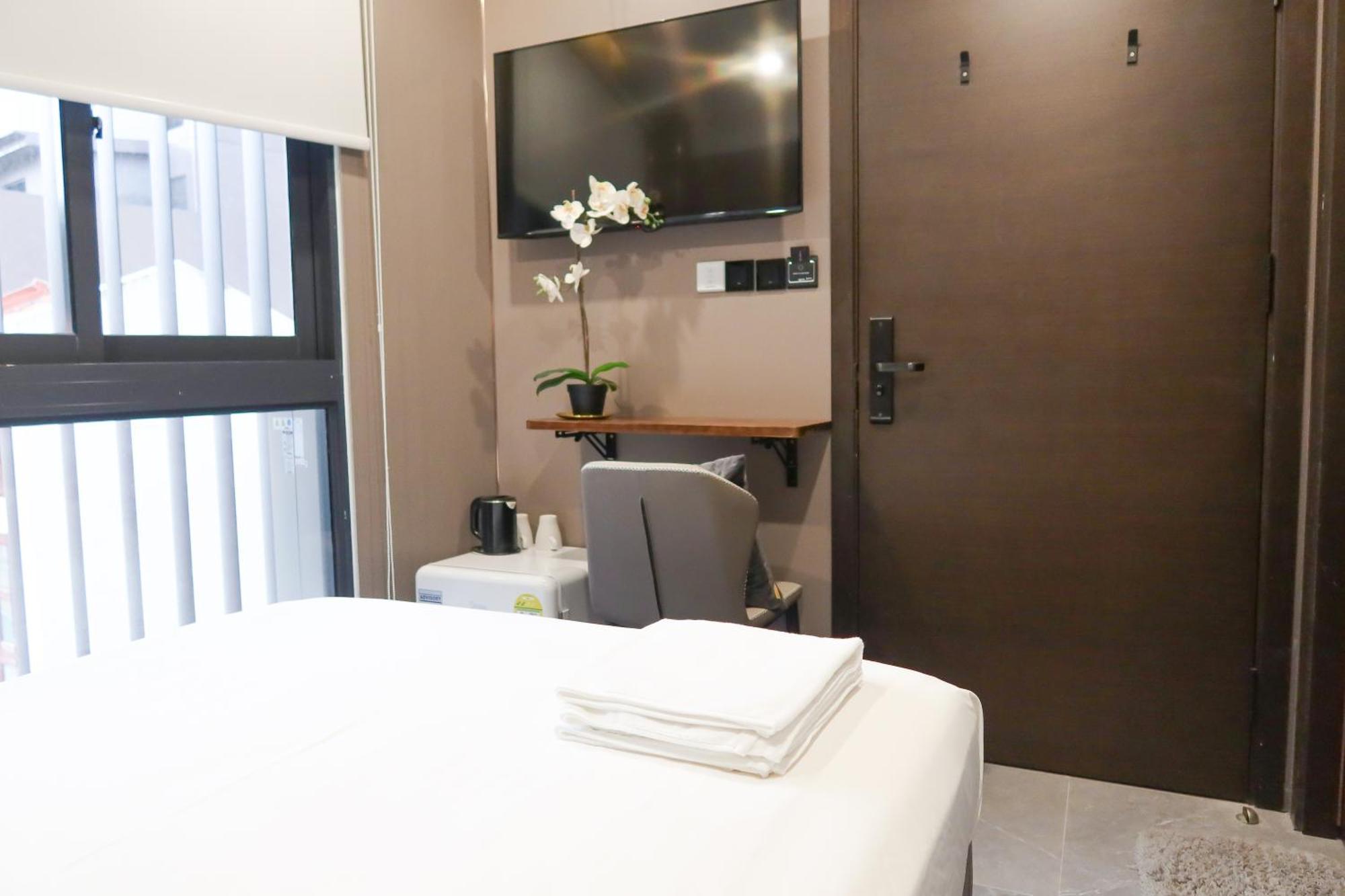 Recharge Studio Apartments&Suites Singapur Habitación foto